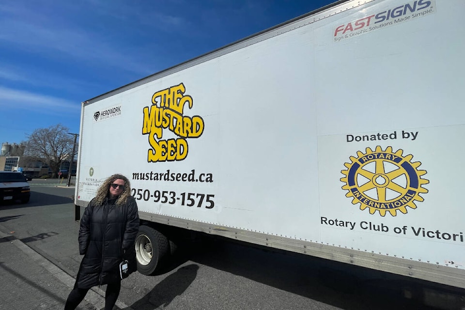 Treska Watson, the director of operations at the Mustard Seed Street Church stands in front of a truck used to move donations from the location in Esquimalt after a fire on Monday, March 27 caused damage to the inside of the location in Victoria on Queens Avenue. (Hollie Ferguson/News Staff)