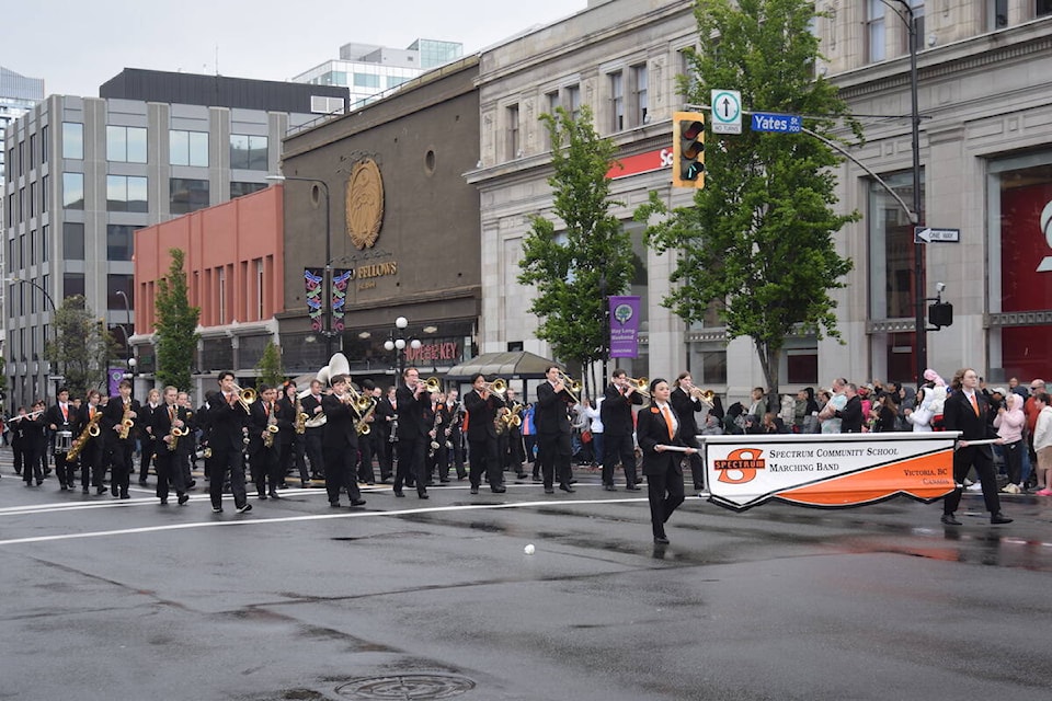 32795982_web1_230522-vne-VictoriaDayParade-Spectrummarchingband_1