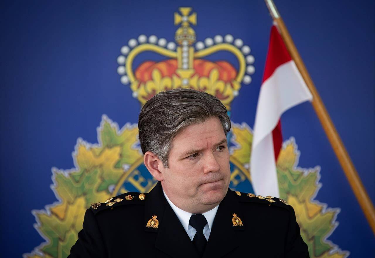RCMP Assistant Commissioner Dwayne McDonald pauses while speaking during a news conference in Burnaby, B.C., on Monday, May 10, 2021. Top police officials in British Columbia are trying to reassure the public about safety after a gang war left two men dead and an innocent bystander hurt this weekend. THE CANADIAN PRESS/Darryl Dyck