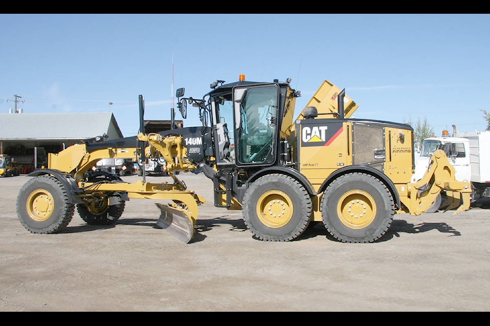 New District of Vanderhoof grader - 2017 Finning CAT 140M Grader, cost $421,320, delivered September. Operated with two electro-hydraulic joysticks instead of a steering wheel. The left joystick controls steering, articulation, gears. The right joystick controls drawbar, circle and moldboard functions as well as electronic throttle control. Joystick lean angle mirrors the steer tires’ turning angle. Photo Fiona Maureen