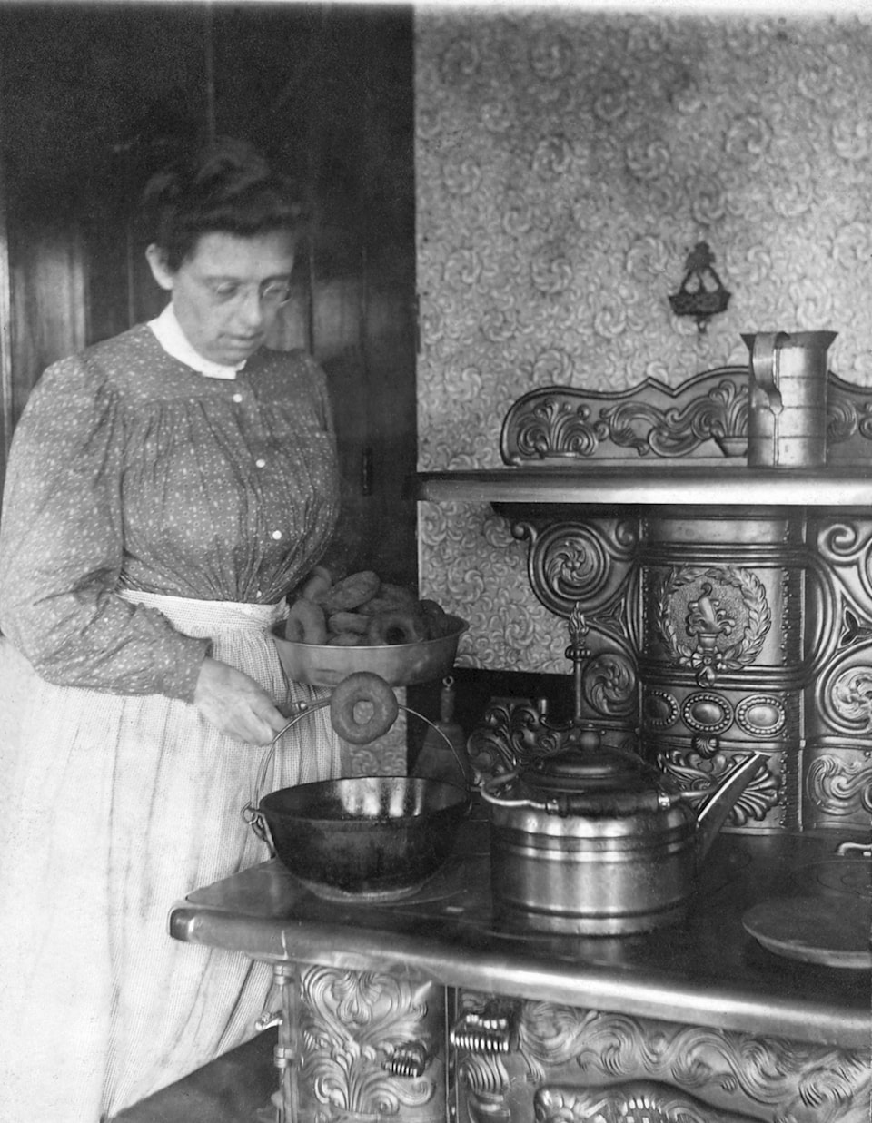 8984701_web1_Making-Donuts-on-old-wood-stove