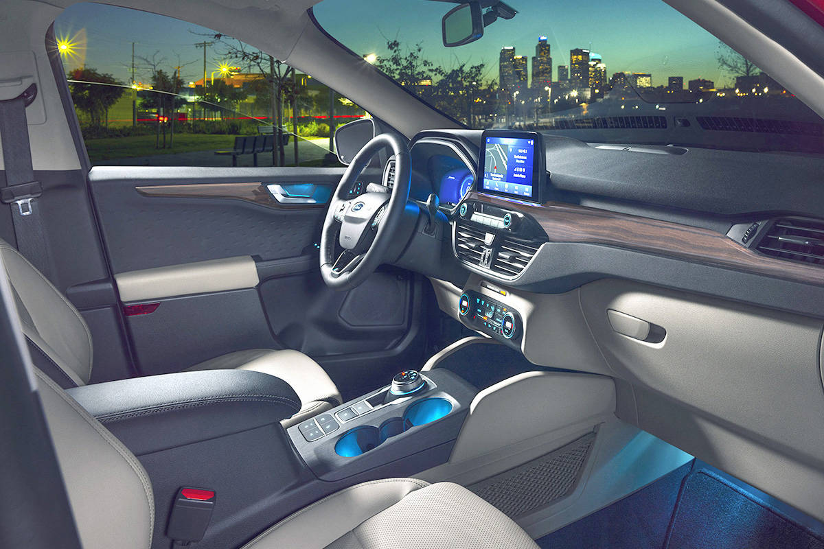 Two obvious changes to the 2020 Escapes interior include a touch-screen that juts out of the dash, and a shift dial for the transmission. PHOTO: FORD