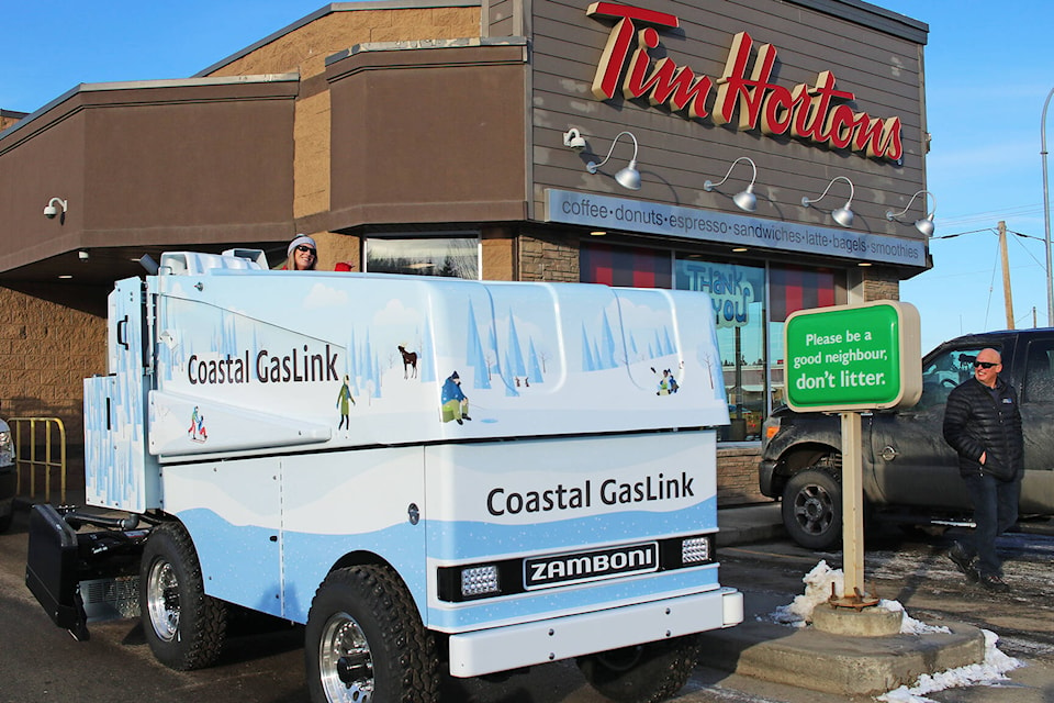 27243573_web1_211125-OEB-ElectricZamboniDrivenThroughTimmies-Vanderhoof_2