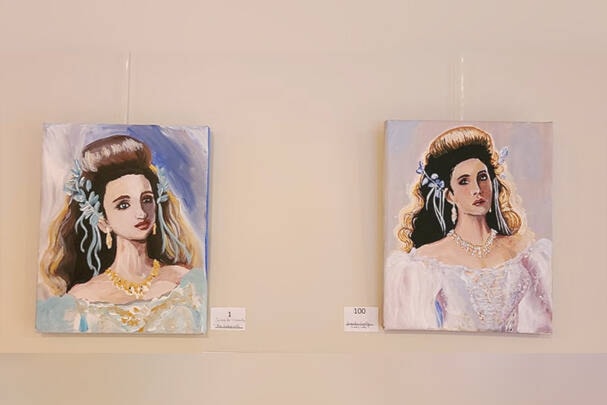 Magdalena Saito shows her improvements in painting portraits. The painting on the left was her first portrait, and on the right is her hundredth. (Photo submitted)