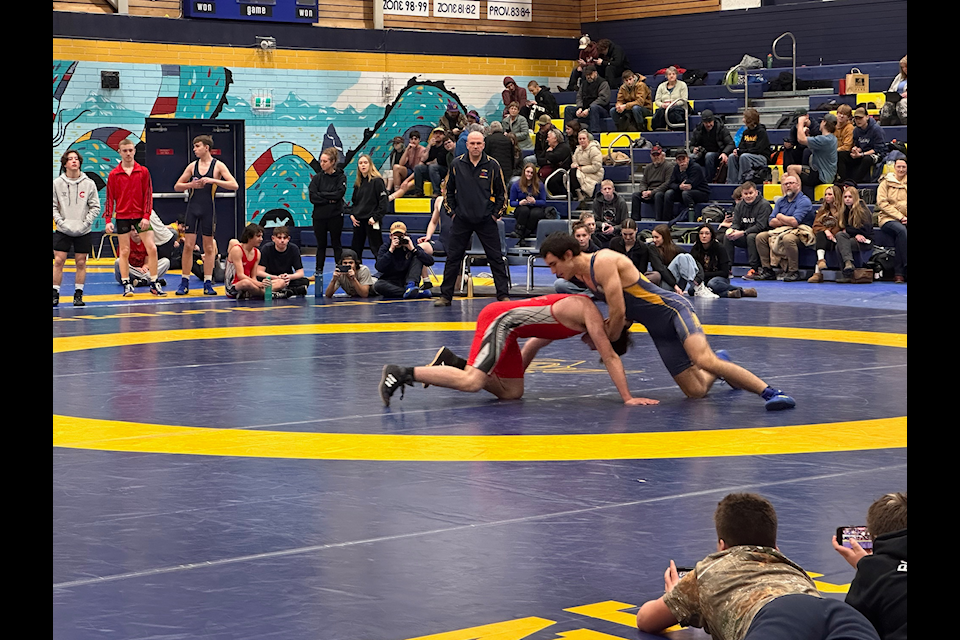 Declan Cunningham from NVSS and Benjamin Teichroeb from Shas Ti Kelly Road at North Central Zone Championships Feb. 6, 2025.