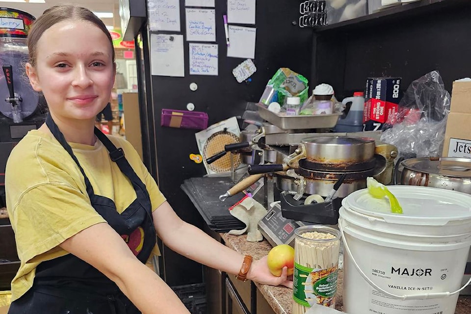 Lynza Henke makes goodies at her families store Vernon Teach and Learn, in the Lollipop Lane department.