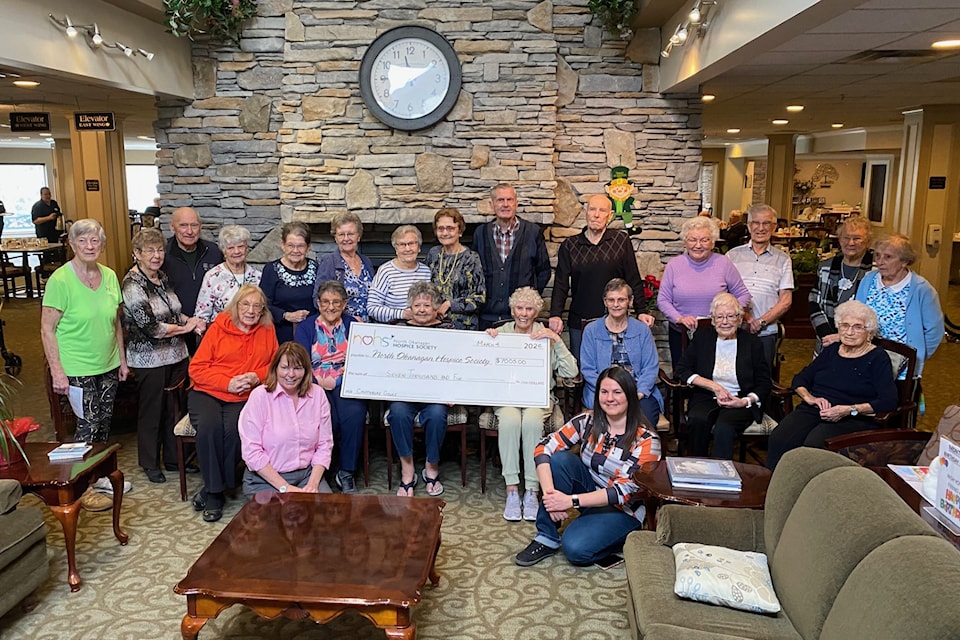 North Okanagan Hospice Socity accepts a cheque for $7,005 from Canterbury Court residents.