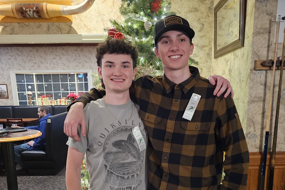 Matthew Leach (right) with his guide Chase Ferguson at the Lumby fundraiser to get them training for the Canadian Paralympic Team.