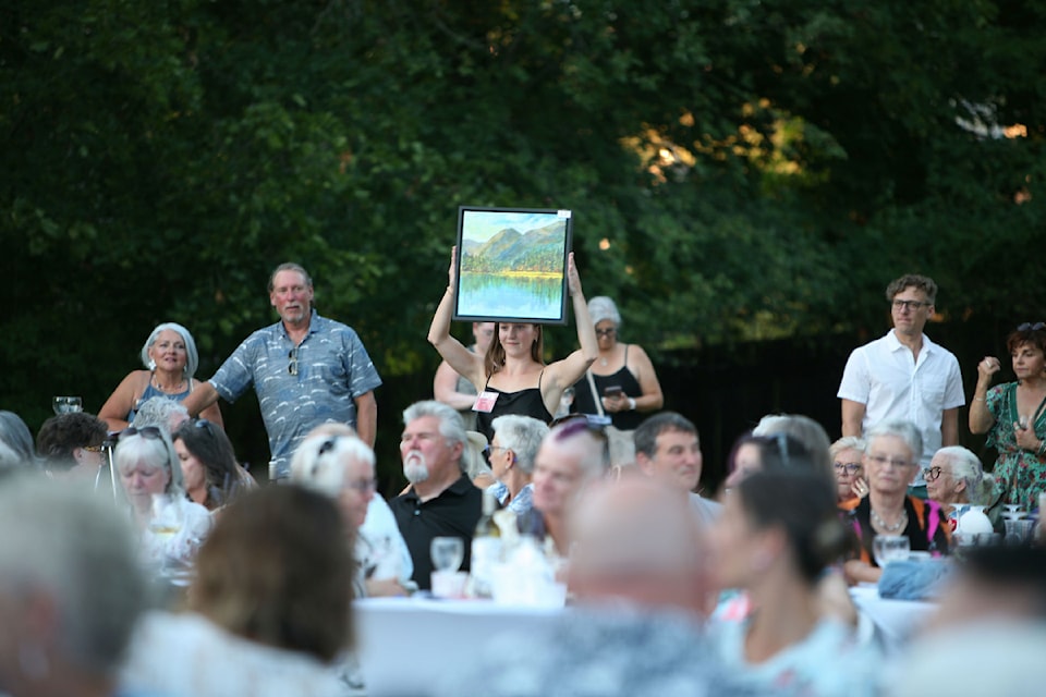 A live art auction is featured at the Midsummer's Eve of the Arts July 17.