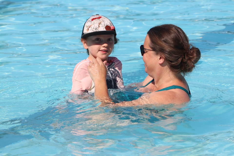 Olive enjoys the new Lakeview Peanut Pool with her mom Holly Stitt Thursday, July 11.