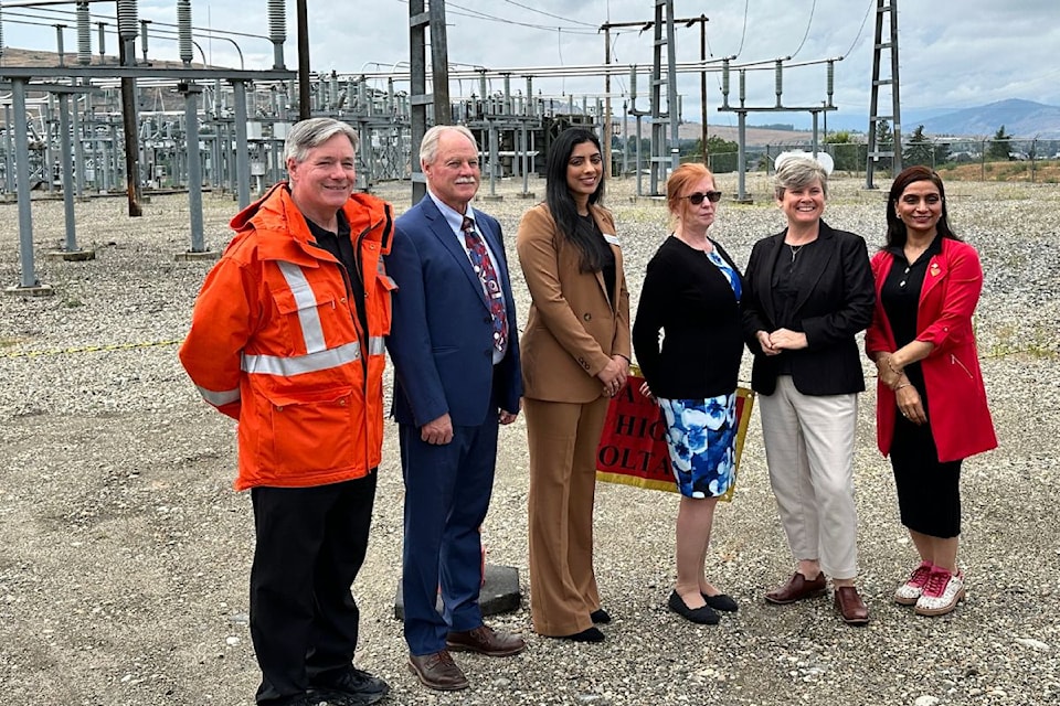 From left: BC Hydro, Vernon Mayor Victor Cumming, Kirndeep Nahal, president of the Greater Vernon Chamber of Commerce, Maureen Daschuk, BC Hydro's executive vice-president of integrated planning, Josie Osborne, Minister of Energy, Mines and Low Carbon Innovation, and MLA Harwinder Sandhu pose in front of the east Vernon substation after the funding announcement for close to $6 billion dollars in capital energy projects across the southern interior. 