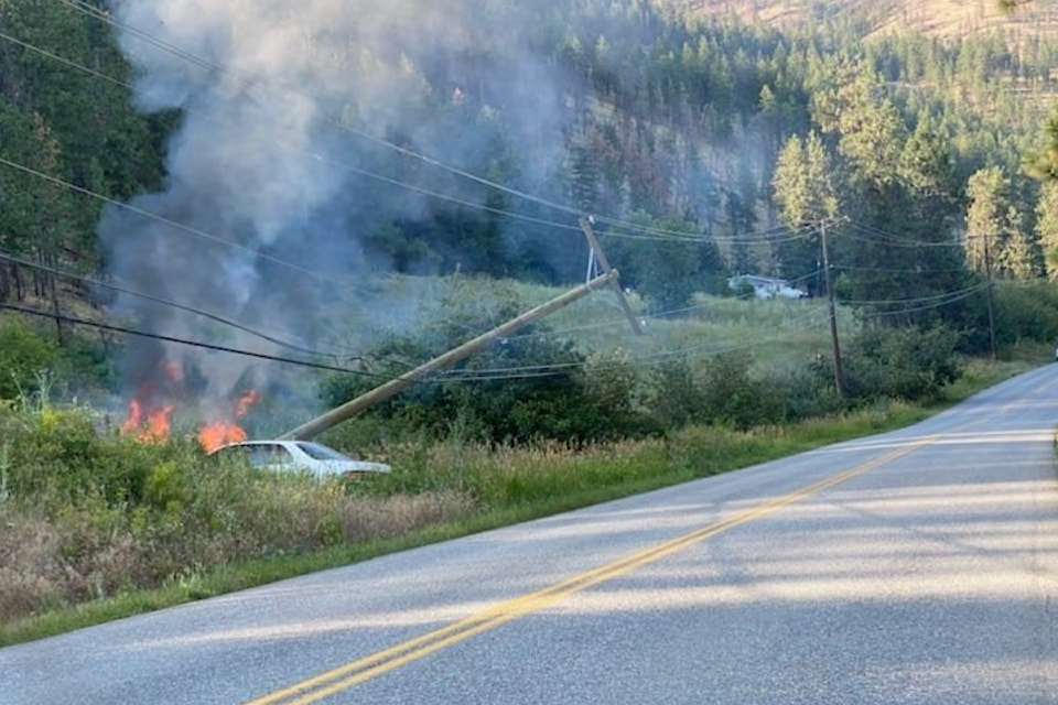 Car crash on Westside road sparks fire, July 15. 