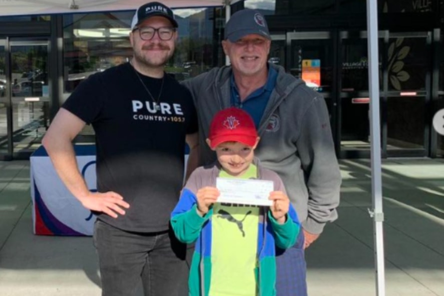 Eight-year-old Hunter Ellis was only 16 days old when he presented his first cheque to the Vernon Jubilee Hospital Foundation to benefit the Women and Children’s Unit at VJH. Grateful for the care they received when Hunter was born, Rob and Hunter continue to support VJH and the incredible staff however they can. On May 31, Hunter (front) and his dad Rob (right) joined Pure Country 105.7 host, Gentry Turner (left), at the 21st annual Have a Heart Radiothon in support of VJH Foundation.