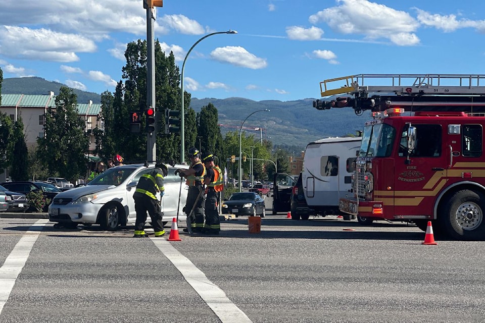 A collision between a car and vehicle towing a trailer at Dilworth Drive and Harvey Avenue (Highway 97) in  late Monday afternoon, June 24, has snarled traffic.