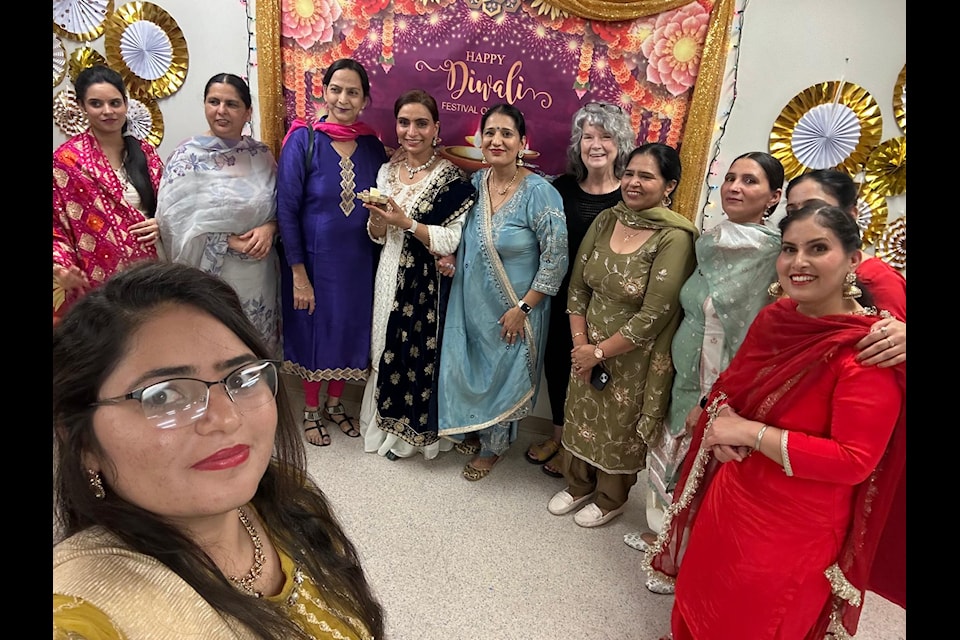 Women celebrate Diwali at People Place in Vernon Oct. 25.