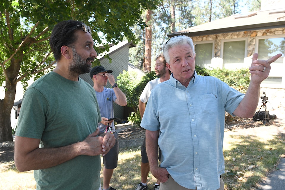 Amandeep Singh speaks with homeowner Josh Langner about retrofits to his East Hill home.