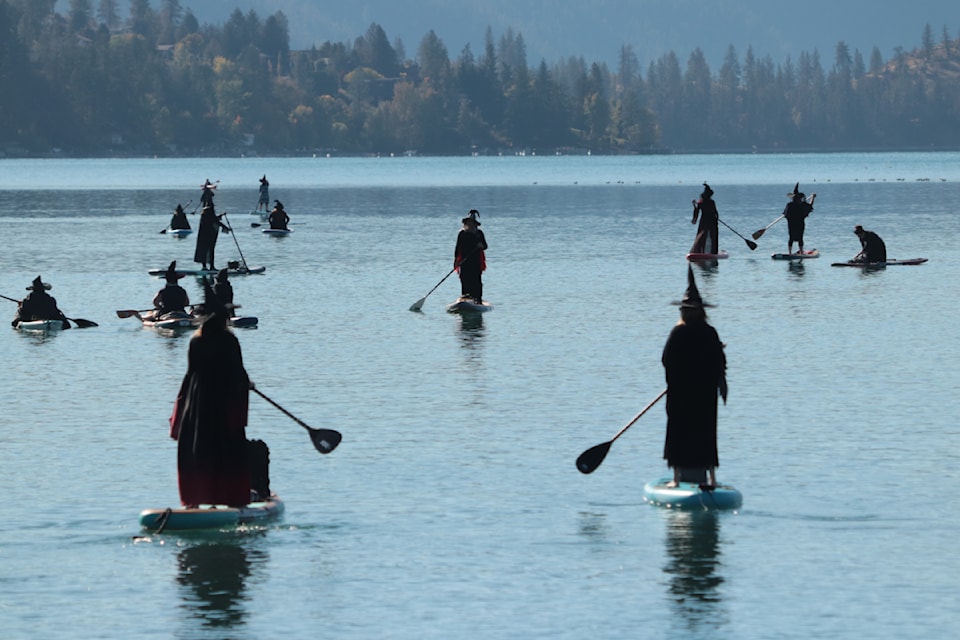 Dozen of people dressed as witches, and other spooky costumes, hit the waters of Kal Lake for the Witches and Warlocks paddle Saturday, Oct. 12, 2024.