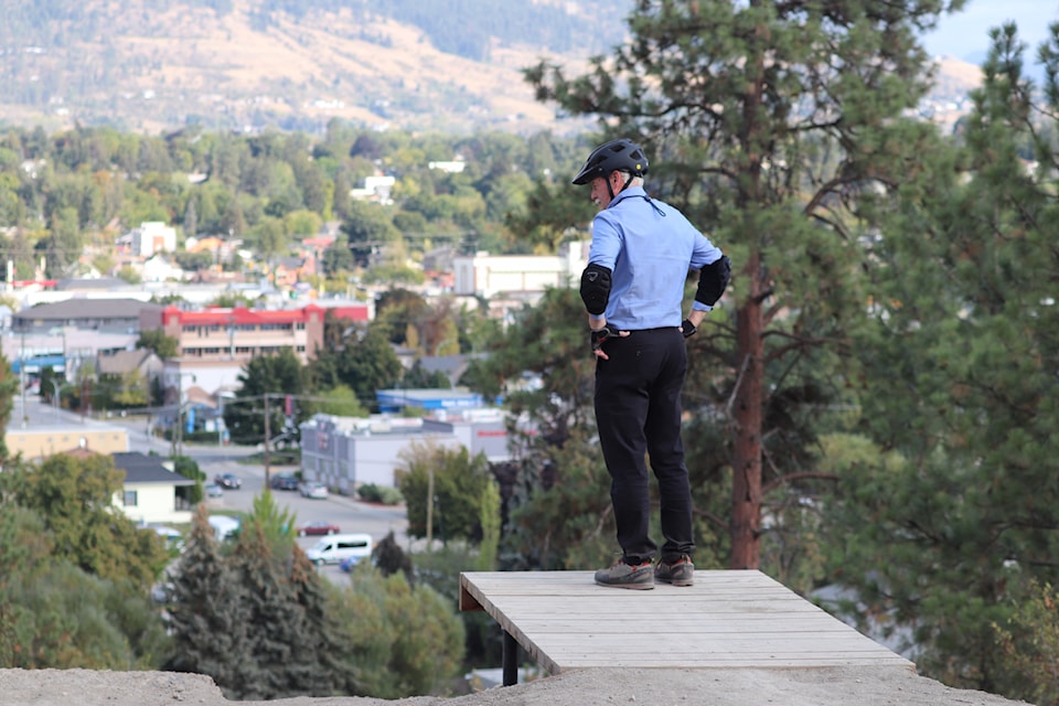 Vernon mayor Victor Cumming checks out the view from the new drop zone at Becker Bike Park.