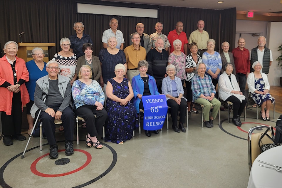 Surviving member of the Vernon High School Class of 1959 gather for a photo at their 65th reunion Wednesday, Sept. 11, at the Schubert Centre.