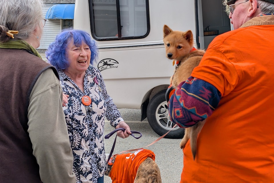 NDP candidate Leah Main meets residents on the road with her mobile campaign office.