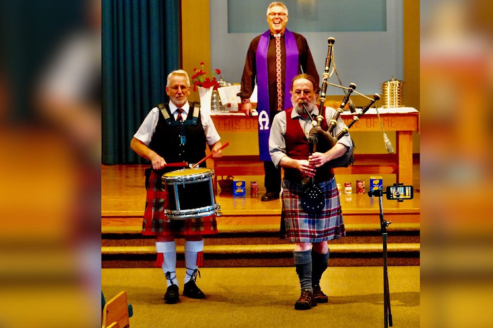 Drummer Ron Light from Shuswap Pipes and Drums, and piper Kerry Parks from the Kalamalka Highlanders welcome the congregation to Tartan Day service at Vernon's Trinity United Church Sunday, April 6.