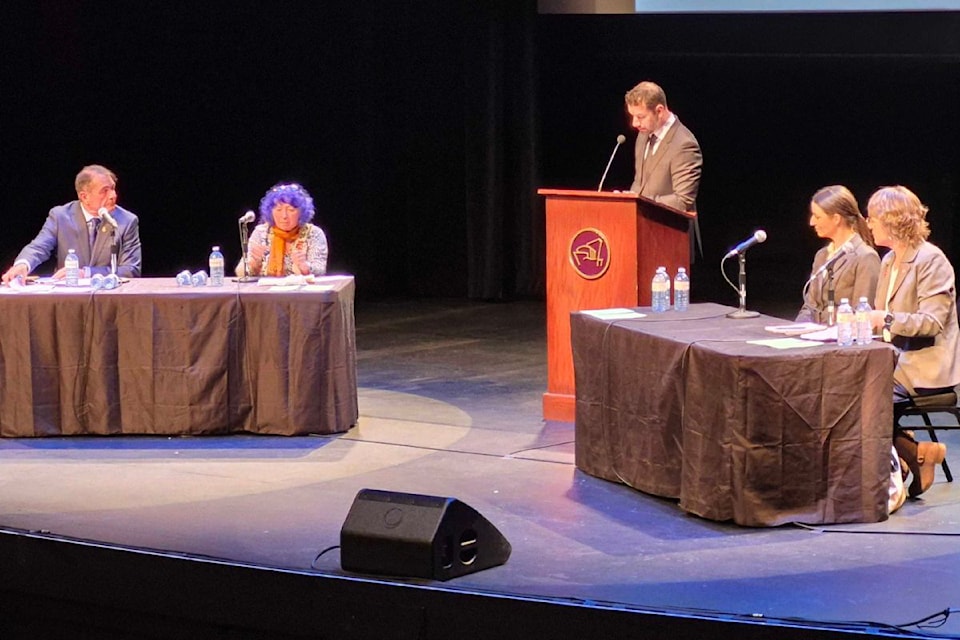 Vernon-Lake Country-Monashee riding candidates Scott Anderson (Conservatives, from left), Leah Main (NDP), Glair Visscher (Green Party) and Anna Warwick Sears (Liberal Party) listen to a question from moderator Dan Proulx at a forum presented by Proulx's organization, the Greater Vernon Chamber of Commerce, Thursday, April 17, at the Vernon and District Performing Arts Centre.