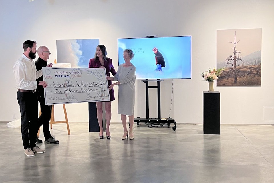 Ian Galbraith (from left), representing the Galbraith Family Foundation, presents a $1 million donation to Vernon Public Art Gallery curator Lubos Cullen, gallery executive director Dauna Kennedy and gallery president Sarah Kennedy.
