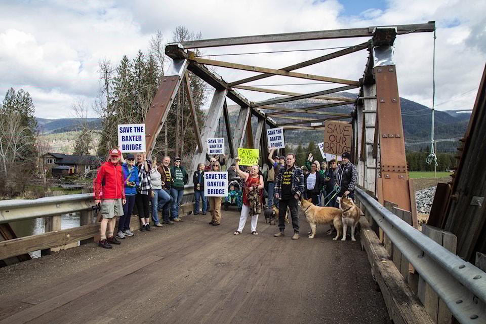 Residents held a rally on Baxter Bridge Wednesday, April 9, 2025, demonstrating their desire to have the North Okanagan structure preserved after construction on its replacement is completed. 