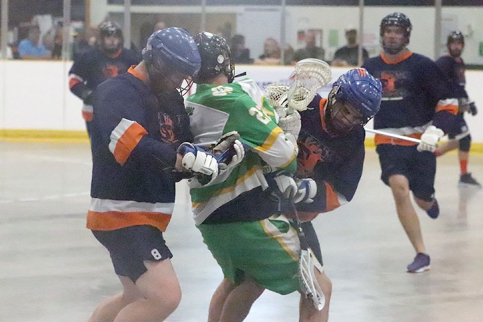 The longtime senior lacrosse rivalry between the Vernon Tigers (blue) and the Armstrong Shamrocks may be in jeopardy, as the Tigers contemplate folding in 2025 due to a lack of skilled, experienced players.