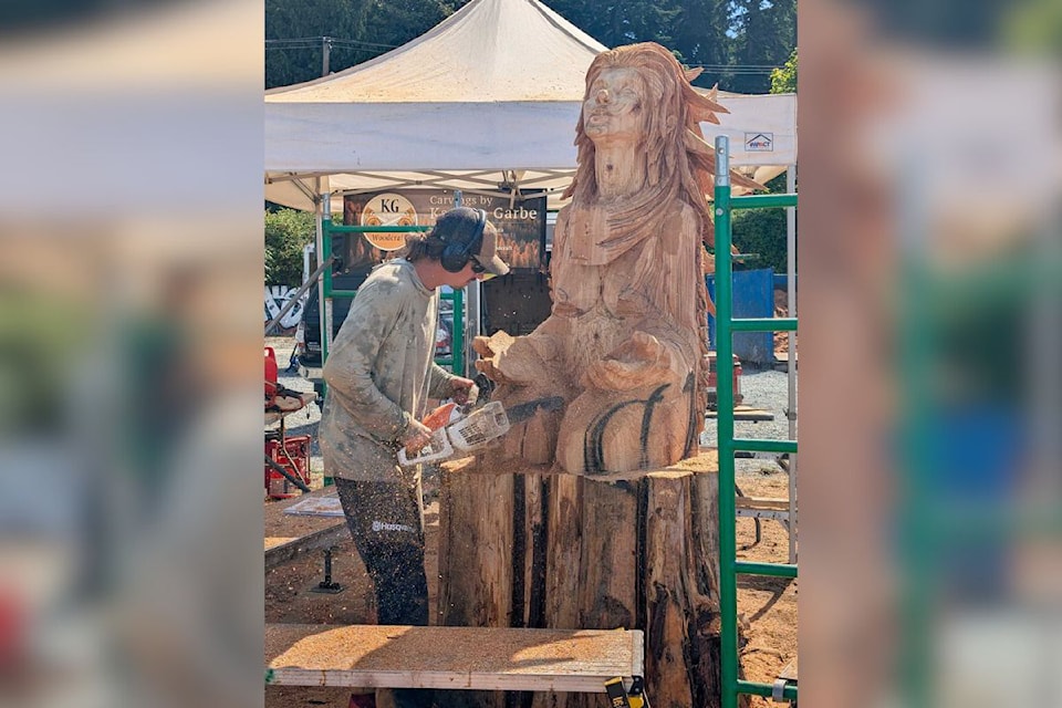Armstrong's Kamron Garbe works on what would become the winning creation at the 2025 Powell River Logger Sports' Chainsaw Carving Competition, held July 9-13, at the Sunshine Coast. 