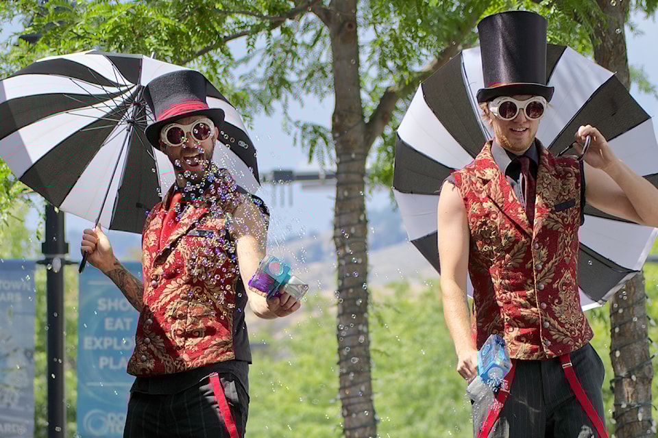 Kinshira Entertainment parades the streets for the Downtown Vernon Performance Festival Saturday, July 19.