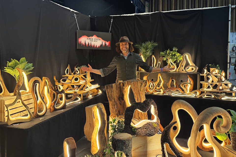 Jorge Izaza had his handmade wooden lamp creations for sale at the 50th annual Creative Chaos Festival Friday, June 6, 2025. 