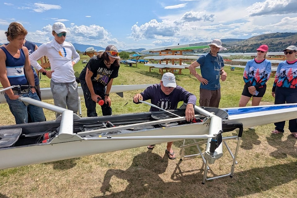 Terry Paul delivering some boat rigging lessons to Vernon rowers.