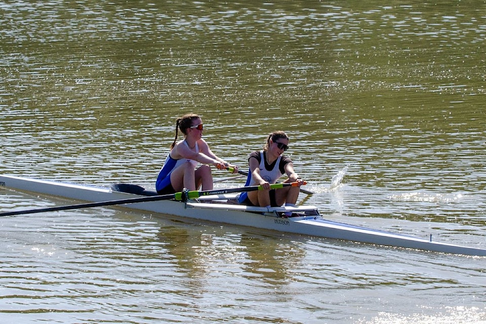 Sierra Munroe (left) and Aida Mills (right) rowing their paint boat to the start line at the  Delta Deas Scholastic Regatta, hosted in the Lower Mainland. 