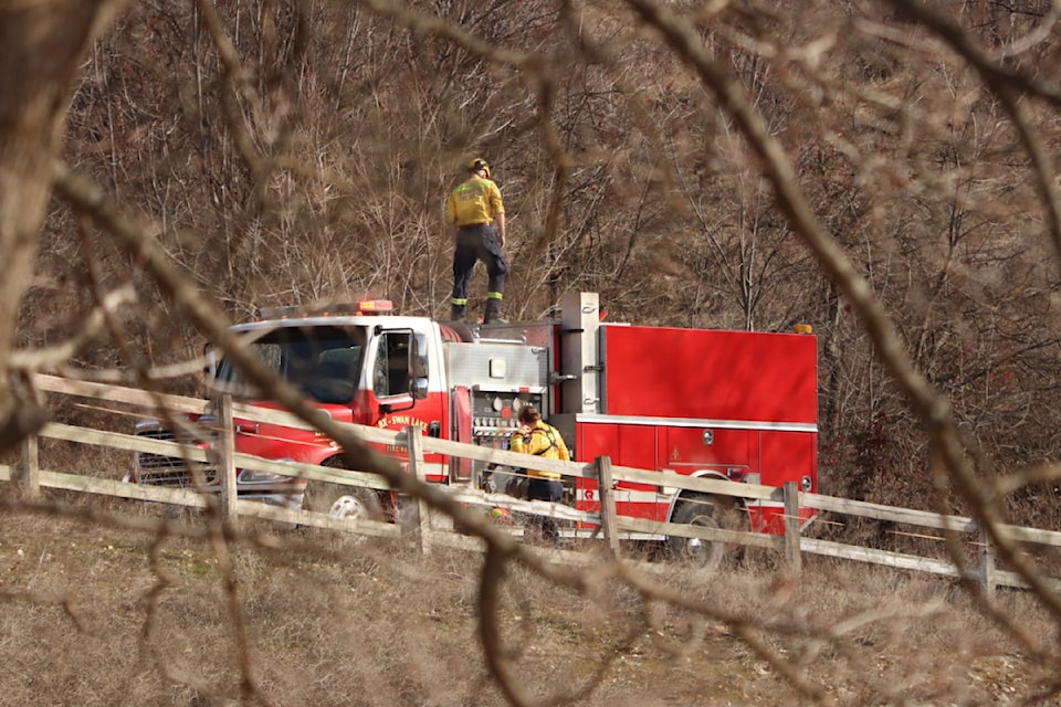 BX-Swan Lake Fire Rescue members are on-scene Friday, March 7, at a property on McLeish Road, off East Vernon Road, following a call reporting "smoke in the grass" at the property.