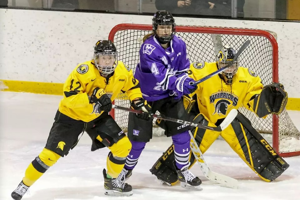 Summerland's Lyndsy Acheson (left) and the Waterloo Warriors fell 3-0 to the Bishop's Gaiters of Sherbrook, Que. in the championship game of the U-Sports Canadian University Women's Hockey Championship Sunday, March 23, in  Elmira, Ont.