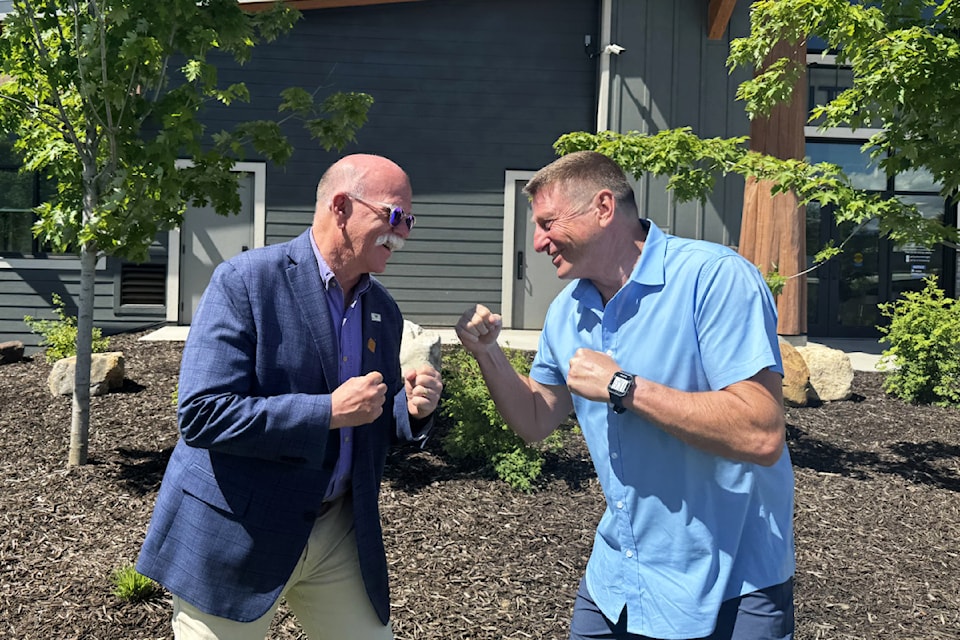 Lake Country mayor Blair Ireland (left) and Armstrong mayor Joe Cramer square off at the Okanagan Basin Water Board's launch of the 2025 Make Water Work campaign, signalling the competitive spirit they'll bring to conserving water during the campaign. 