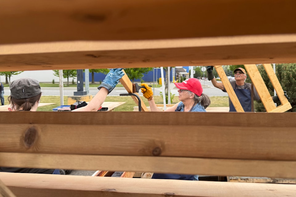 Members of Sleep in Heavenly Peace Vernon and the Vernon She Shed partnered to build 20 beds for youth in need Saturday, May 31, 2025. 