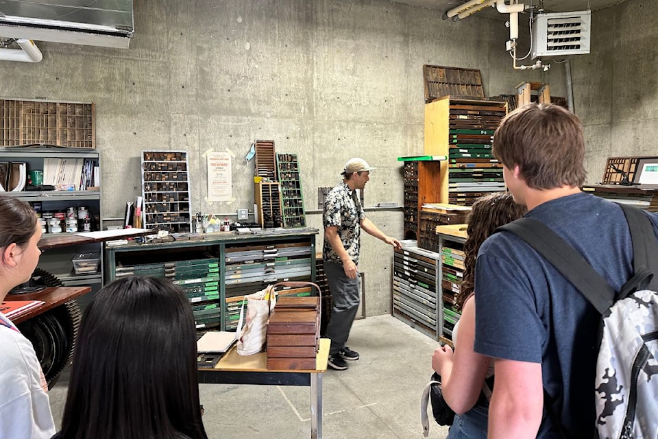 Students learn about the old fashioned printing press in a session for the Experience Okanagan College high school program, hosted at the Vernon campus on Wednesday, May 7.