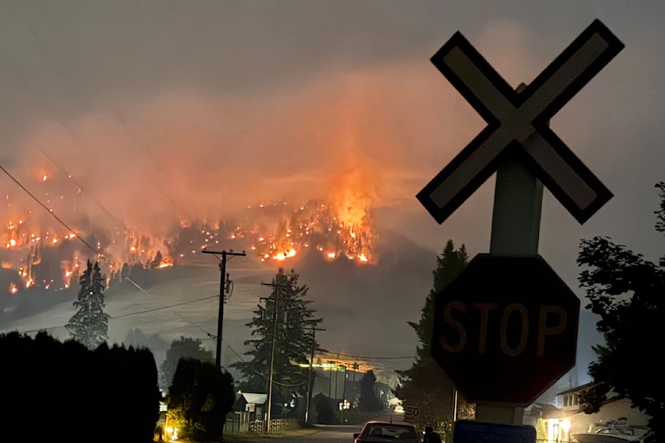 An evening shot of the now 50-hectare wildfire near Lavington Friday, Sept. 5, 2025. Evacuation orders and alerts have been issued around the blaze. 