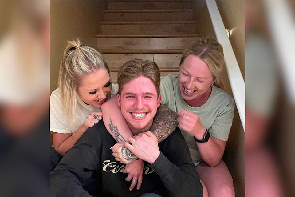 Sisters Brooke (left) and Blaire Toop (right) are co-hosting a memorial fundraiser at Crossfit Vernon Saturday, May 31, open to everyone, in honour of their younger brother Randall (centre). He lost his life to mental health in August 2024.