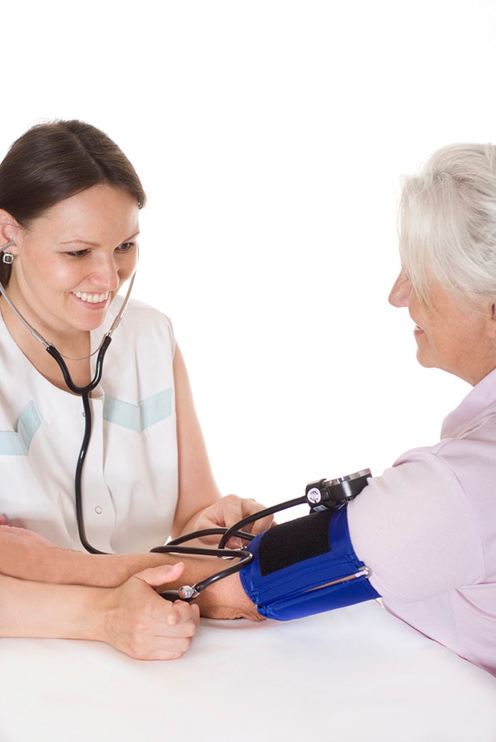 Woman Doctor taking Blood Pressure