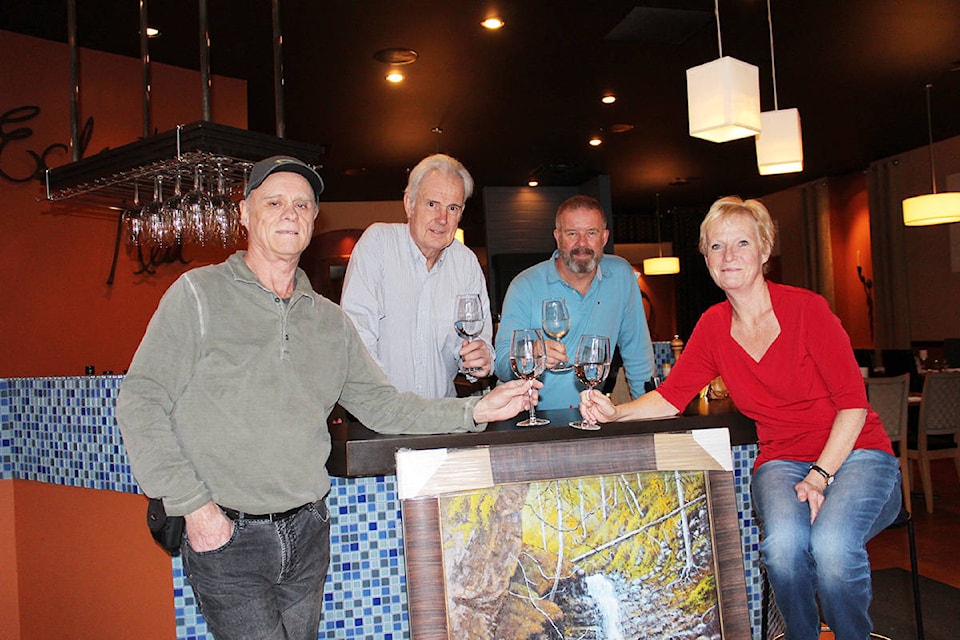 Volunteers are currently seeking donations in support of The North Okanagan Community Life The North Okanagan Community Life Society’s annual Art and Wine Gala will be held at Eclectic Med Restaurant on Feb.24. Tickets are nearly sold out, so organizers say those who plan to attend are urged to act fast. From left, are artist Mike Jell, whose painting of BX Falls will be on the auction block at the gala; NOCLS board member Garry Molitwenik, and Eclectic Med Andrew and Dawn Fradley. (Erin Christie/Morning Star)
