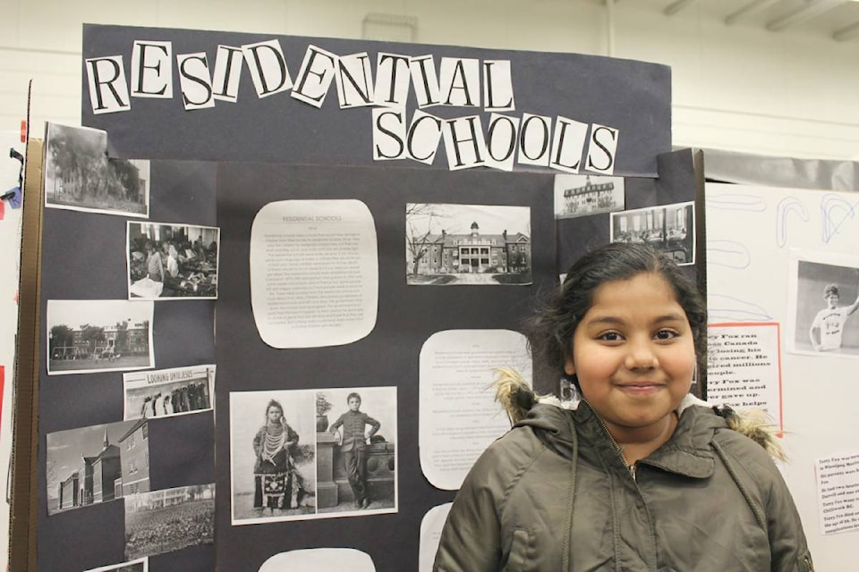 Grade 6 student, Gia Paul researched the history of residential schools in Canada for her Heritage Fair project at Mission Hill Elementary School in Vernon. The fair included 150 students. Twenty-one students and their projects will be selected to advance to the Vernon Fair in April. (Erin Christie/Morning Star)