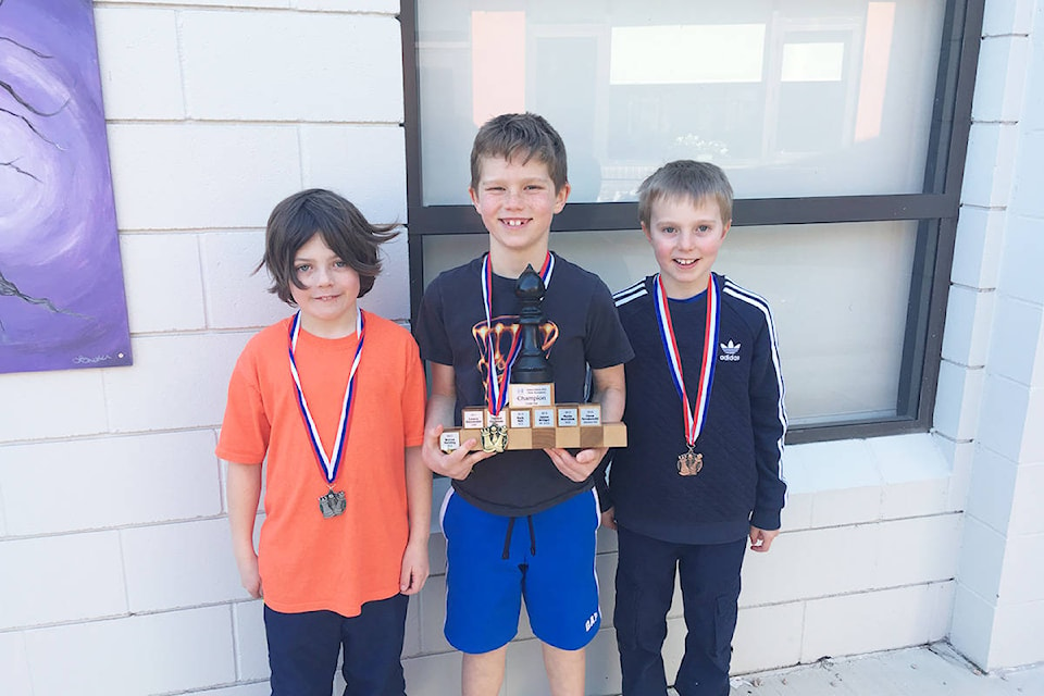 Coldstream students (from left), Robbie Drew (2nd place), Lukas Reimer (1st place), and Rylan Terleski (3rd place) swept the Grade 3 competition in SD23’s District Chess Tournament in Kelowna on March 10. (Photo submitted)