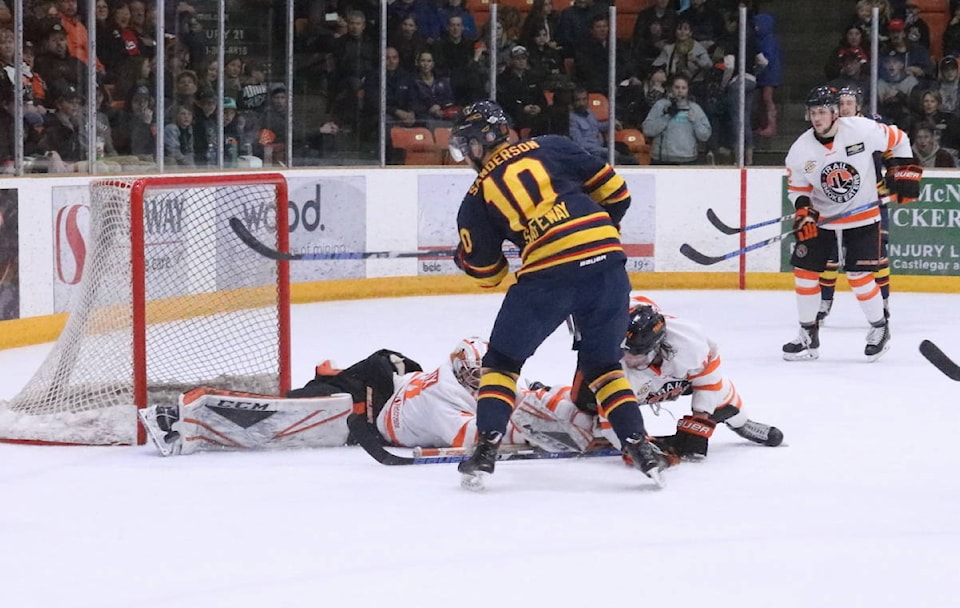 Mack Byers gives the Smoke Eaters the - Trail Smoke Eaters