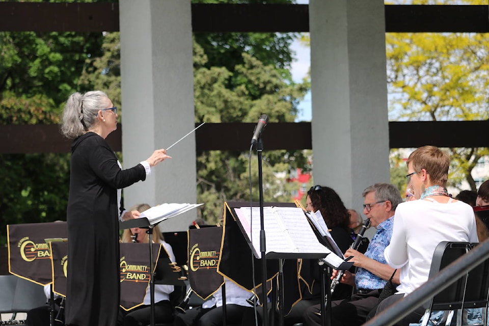 Toni Rose directs the Vernon Community Band during their concert in Polson Park Saturday afternoon. (Katherine Peters - Morning Star)