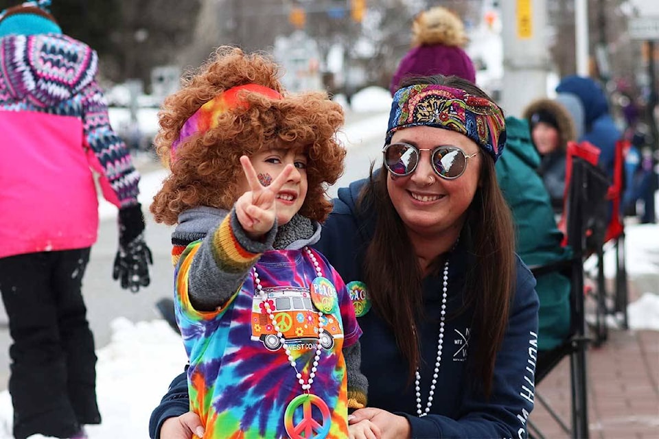 Arlie Slizak and her son, four-year-old Weston, wait with anticipation for the start of the 60th-annual Vernon Carnival Parade at noon on Saturday, Feb. 8, 2020. (Brendan Shykora - Morning Star)