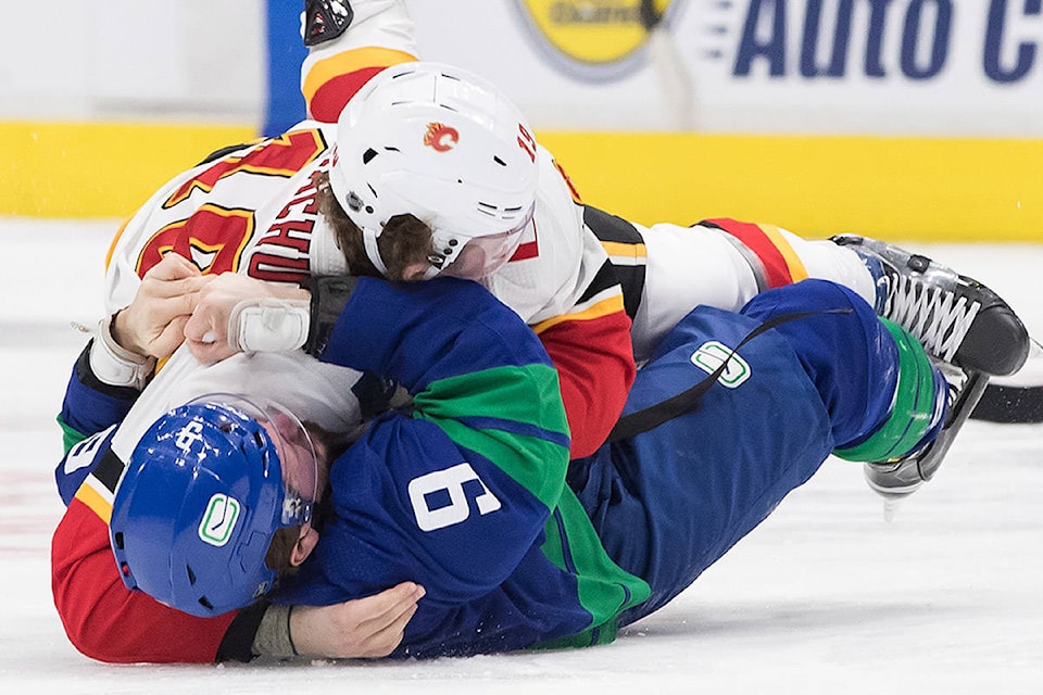 20480834_web1_200208-IFD-Flames-Canucks-fight_1