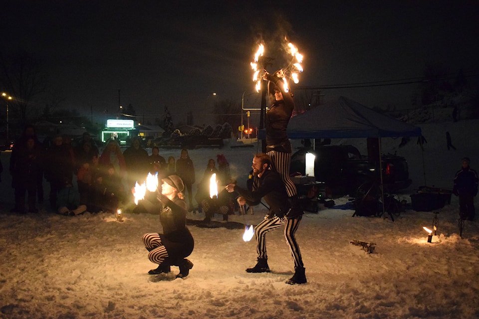 Fire dancers, jugglers and hula hoopers helped kick off the carnival on Friday night at Kin Race Track. (Caitlin Clow - Vernon Morning Star)